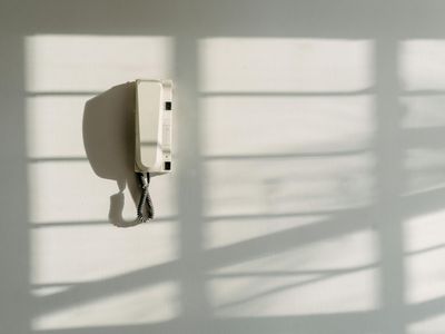 Clean white space with subtle shadow play on walls